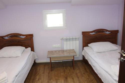Una cama o camas en una habitación de Runada B&B
