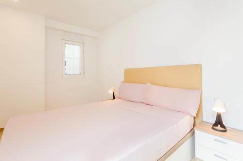 Cama o camas de una habitación en Casa nueva cerca Ciudad Artes y playa