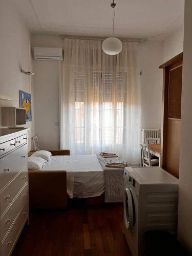 A bed or beds in a room at Abbrescia 50