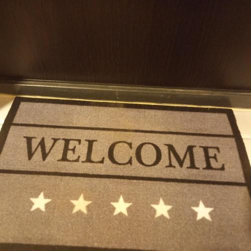 a welcome sign with stars on a table at Rivijera in Belgrade