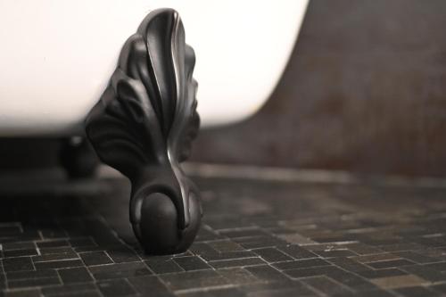 a metal object is sitting on a tile floor at Cannery Pier Hotel & Spa in Astoria, Oregon