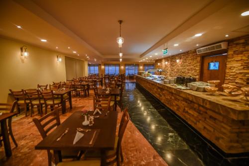 Χώρος καθιστικού στο Blumar El Dome Hotel