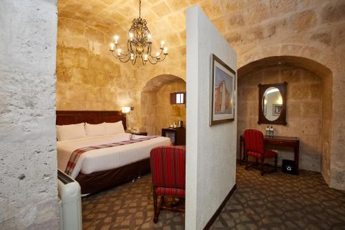 Postel nebo postele na pokoji v ubytování Casa Andina Premium Arequipa
