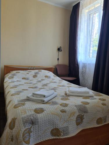 Postel nebo postele na pokoji v ubytování Laine guesthouse