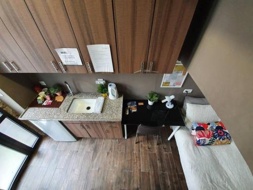Kuchyň nebo kuchyňský kout v ubytování Gabriel Apartments - Superior Studios City Center