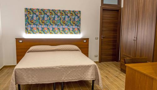 Postel nebo postele na pokoji v ubytování ZAHRA AGRITURISMO