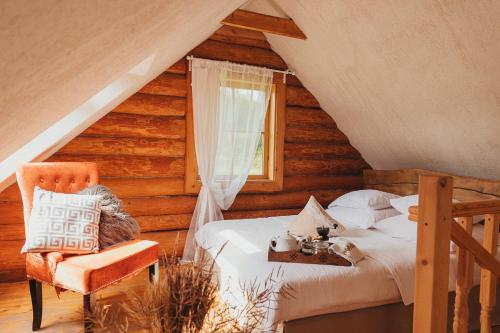Кровать или кровати в номере Jaunlidumnieki