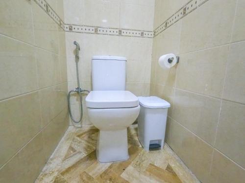 a bathroom with a white toilet in a room at YourPlace Rabat Agdal 1 - Cozy Residence in Rabat