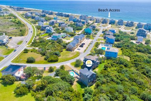an aerial view of a beach area with houses and the ocean at Sun Phun #10HH in Hatteras