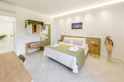A bed or beds in a room at La Pigna Sorrento