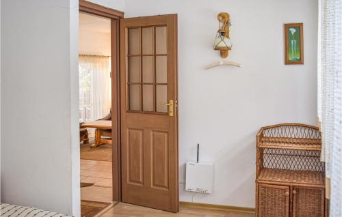 a door leading to a room with white walls at Pet Friendly Home In Sokole Kuznica With Kitchen in Sokole-Kuźnica