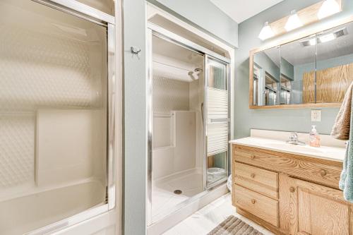 a bathroom with a shower and a sink at Crooked Canyon Lodge in Rapid City