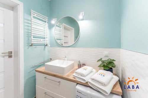 Koupelna v ubytování LABA Kołobrzeg Apartamenty Kasprowicza 20AB