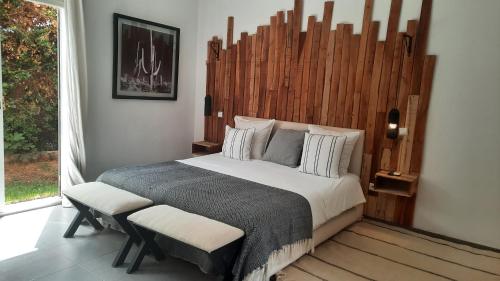 Postel nebo postele na pokoji v ubytování Villa Cactus