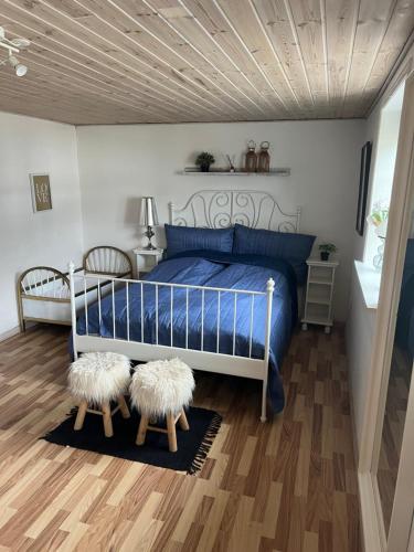 Postel nebo postele na pokoji v ubytování Karensminde