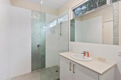 a bathroom with a sink and a shower at OG- By the Sea, 400m to Beach in Ocean Grove