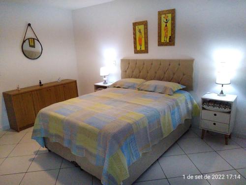 Кровать или кровати в номере Cantinho Bonsai