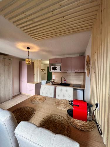 Kuchyňa alebo kuchynka v ubytovaní Studio cocooning style naturel
