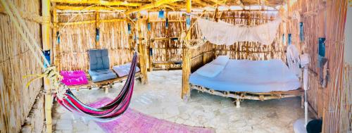 an overhead view of a room with a bed and a hammock at Lala Land Camp in Nuweiba