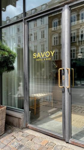 Certifikát, hodnocení, plakát nebo jiný dokument vystavený v ubytování Savoy Hotel