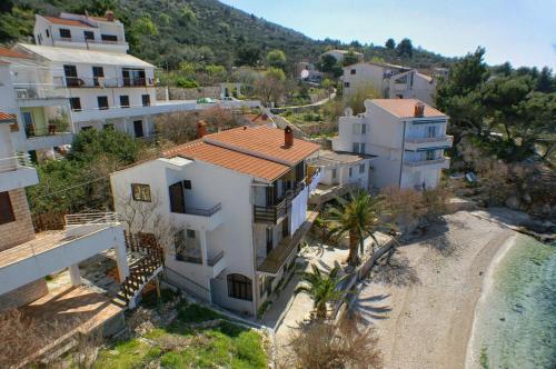 an aerial view of a house on the beach at Apartments by the sea Drasnice, Makarska - 15927 in Drasnice