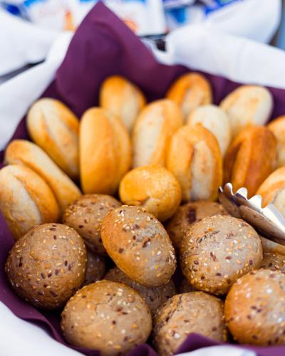 a purple bowl filled with lots of different types of buns at Hotel Villa Bonelli in Fiesole