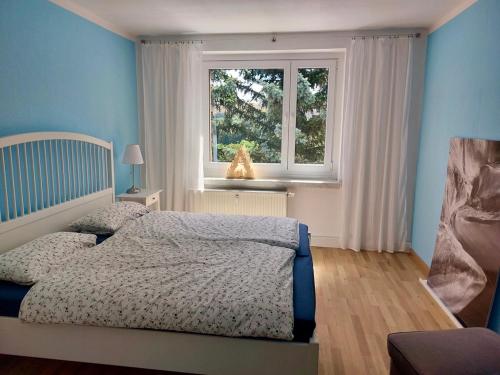 Postel nebo postele na pokoji v ubytování Ferienwohnungen Zauberberg, Schneehase & Glitzerhirsch