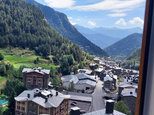 an aerial view of a small town in the mountains at The Lodge at Ribasol in Arinsal