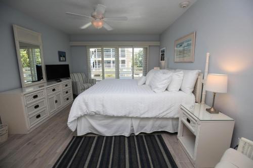 Katil atau katil-katil dalam bilik di Surfside 12 Unit B1