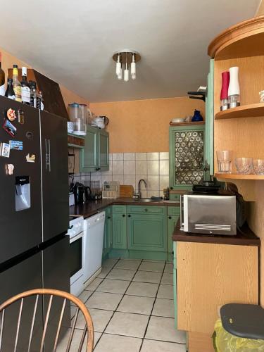 Dapur atau dapur kecil di Gemütliche exklusive 2 Zimmer 67 qm Vollausstattung