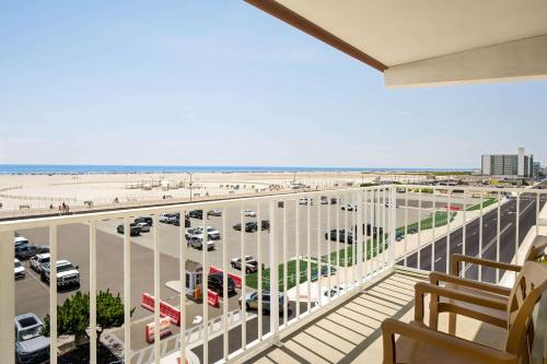 a balcony with a view of a parking lot at Sands Motel in Wildwood