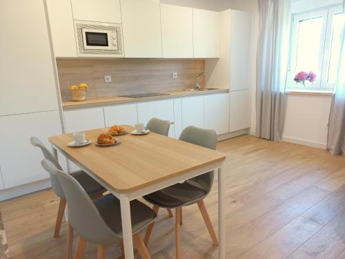 Una cocina o zona de cocina en Apartamentos Pico de Langre
