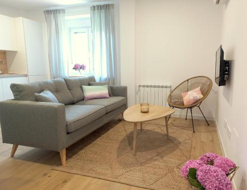 Zona de estar de Apartamentos Pico de Langre