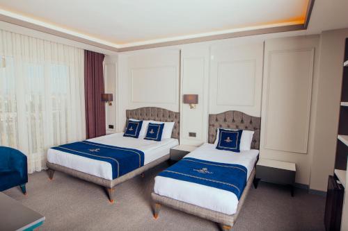 Katil atau katil-katil dalam bilik di GRAND ÇAKIROĞLU HOTEL