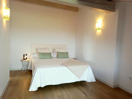 Cama o camas de una habitación en Apartamentos Pico de Langre