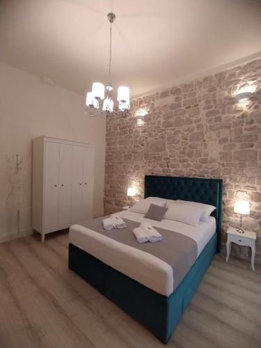Postel nebo postele na pokoji v ubytování Apartment Antique Zadar - City Center