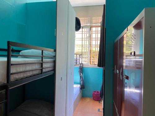 a room with two bunk beds and a window at Hostel Center Madrid in Madrid