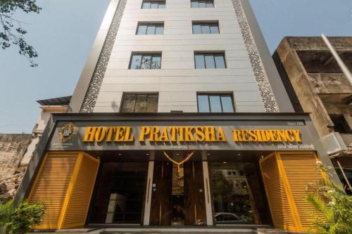 a building with a sign that reads hotel frankenstein restoration at HOTEL PRATIKSHA RESIDENCY in Navi Mumbai