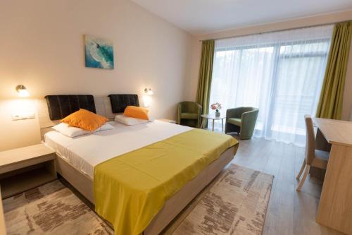 Postel nebo postele na pokoji v ubytování Hotel Nicoleta