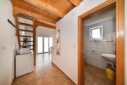 Kuchyňa alebo kuchynka v ubytovaní Apartments Zrakic