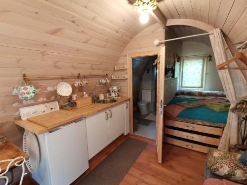 Kuchyň nebo kuchyňský kout v ubytování Tiny Cottage CASA UCCELLO