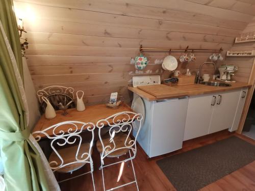 Kuchyň nebo kuchyňský kout v ubytování Tiny Cottage CASA UCCELLO
