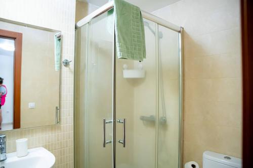 a shower with a glass door in a bathroom at Apartamento Poleo in Icod de los Vinos