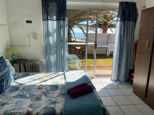 Ένα ή περισσότερα κρεβάτια σε δωμάτιο στο Die Anker Guesthouse