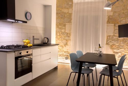 Una cocina o zona de cocina en Funduq ospitalità iblea