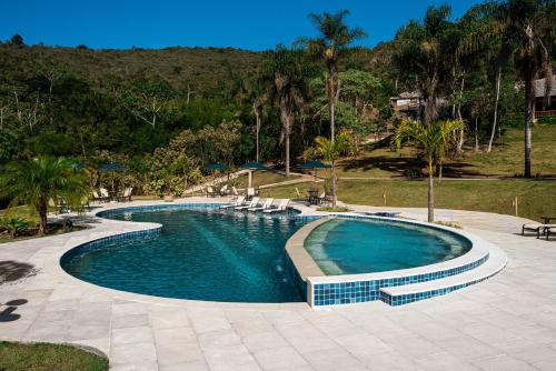 A piscina localizada em Embaúba Boutique Hotel ou nos arredores