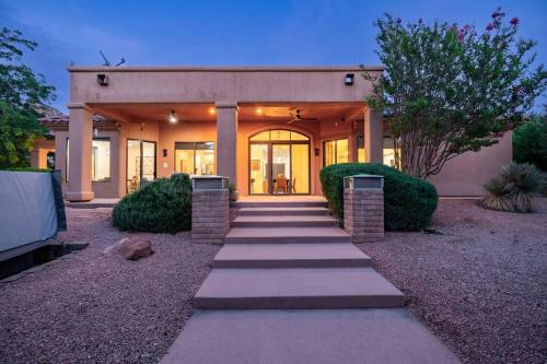a home with a walkway in front of it at Amazing Luxury Home with Hot Tub & Views in Sedona