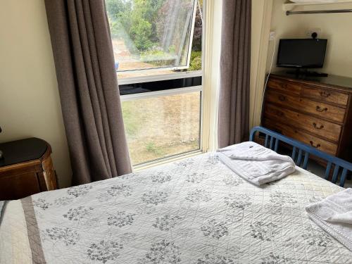 Postel nebo postele na pokoji v ubytování Stable Lodge Self-Catering