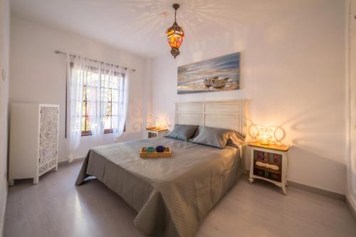 A bed or beds in a room at LARIMAR en Balcon del Mar