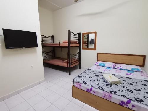 Rúm í herbergi á Nipahmas Chalet